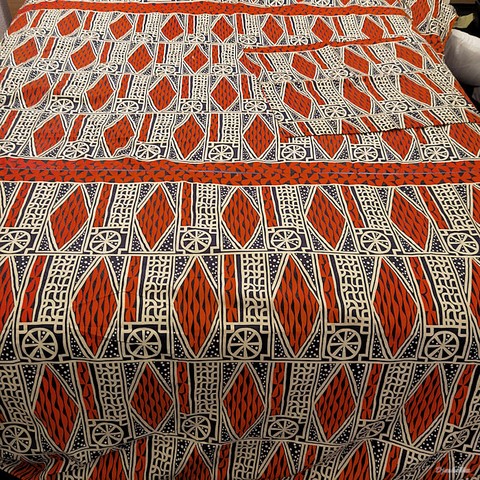 Reversible duvet + pillowcases in wax fabric,