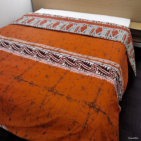 Reversible duvet + pillowcases in wax fabric,