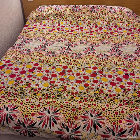 ​Reversible duvet + pillowcases in wax fabric,