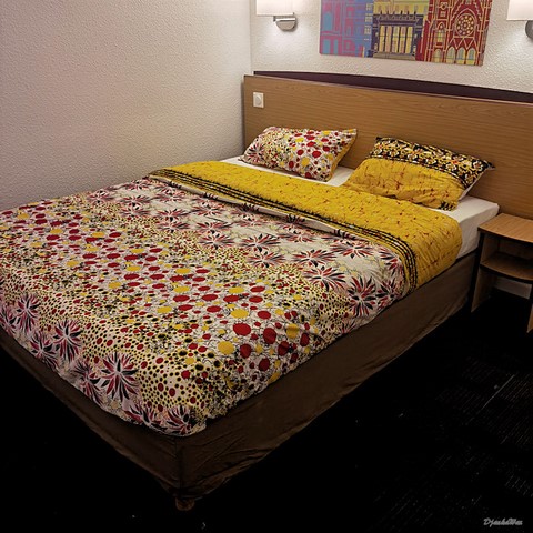 ​Reversible duvet + pillowcases in wax fabric,