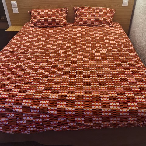 Reversible duvet + pillowcases in wax fabric,