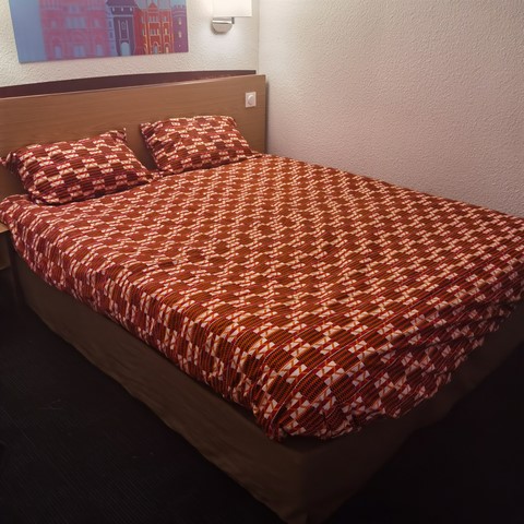 Reversible duvet + pillowcases in wax fabric,